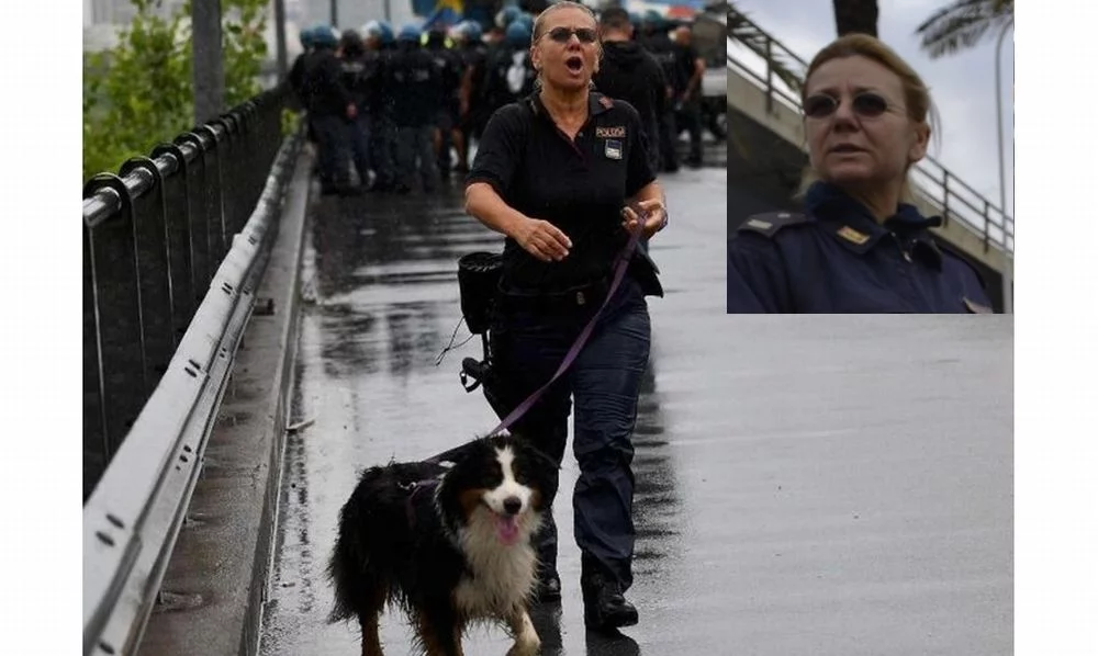 Night Spirit al guinzaglio accanto alla sua conduttrice della Polizia di Stato.